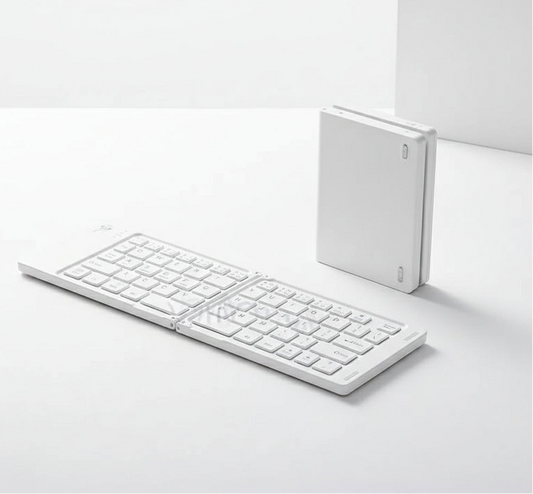 ✨ Clavier Sans Fil Pliable – Mini & Élégant